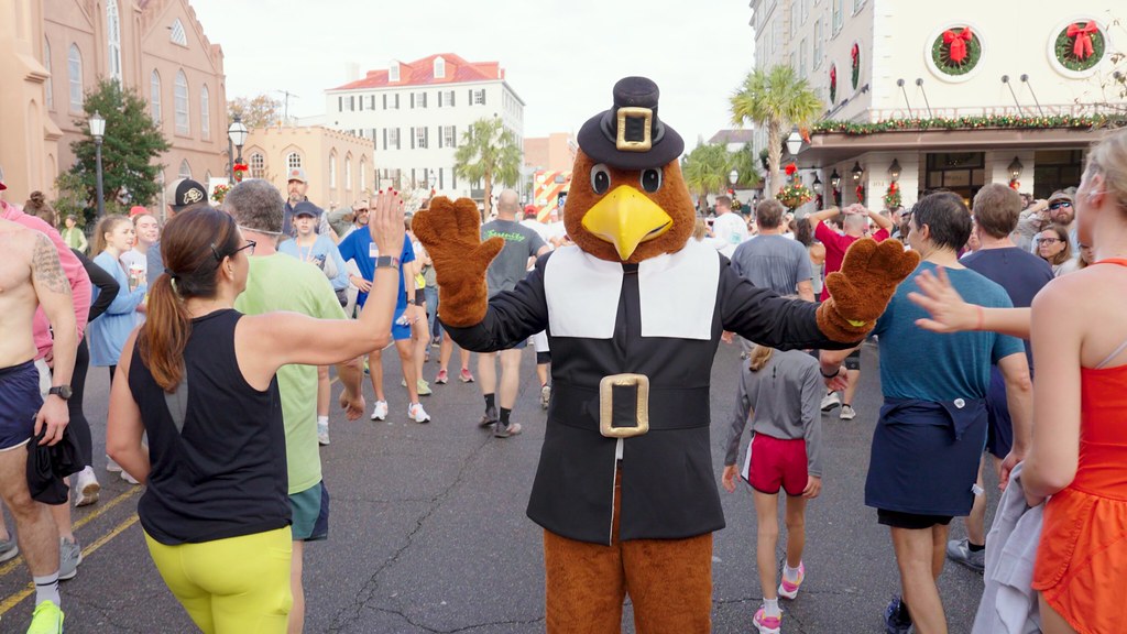 Turkey Mascot high fiving runners